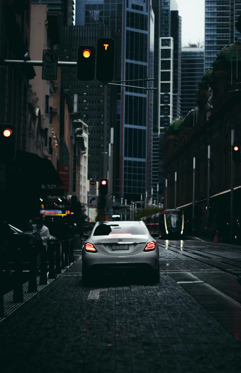 Private airport transfer in Vienna with Mercedes sedan through city streets